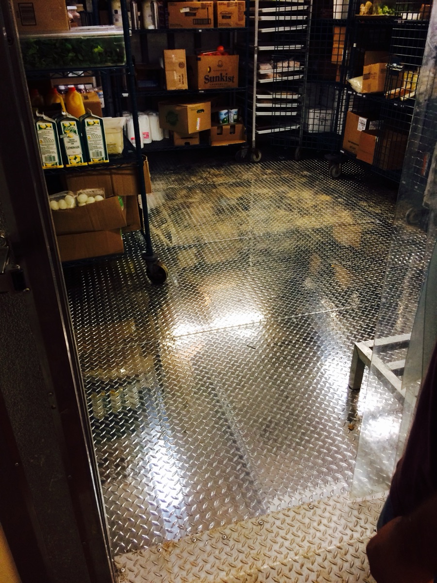 New aluminum diamond-plate floor installed in a restaurant walk-in cooler