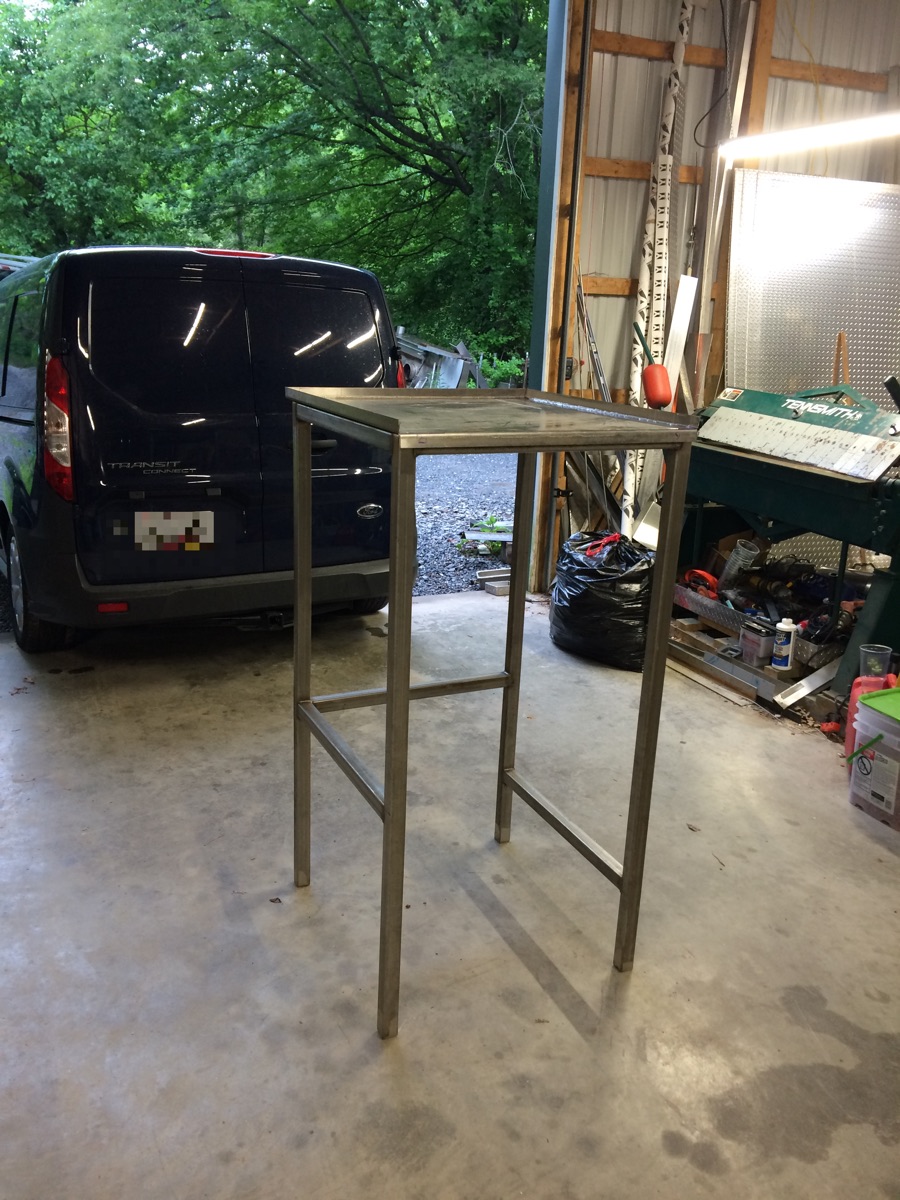 Custom-fabricated stainless steel equipment table